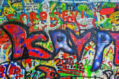 PRAGUE, CZECH REPUBLIC, APRIL 28, 2012: Lennon Wall is filled with John Lennon-inspired graffiti