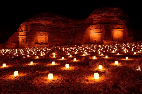 Illuminated Nabataean tombs at night, Hegra or Mada'in Salih, AlUla region, Medina province, Saudi