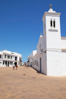 Carrer de ses Escoles and the church of Sant Antoni Abad, Fornells, Es Mercadal, Menorca, Balearic
