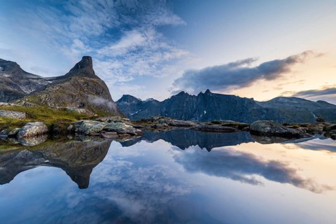 Romsdalshornet mountain reflected in mountain lake, Åndalsnes, Møre og Romsdal, Norway, Europe