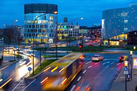 Evening city centre traffic in Essen, large intersection, roundabout, Berliner Platz, this area