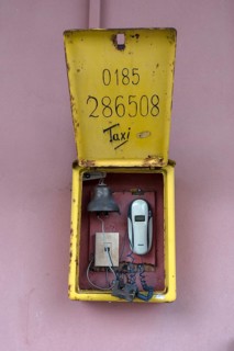 Railway telephone at the station building in Portofino, Italy, Europe