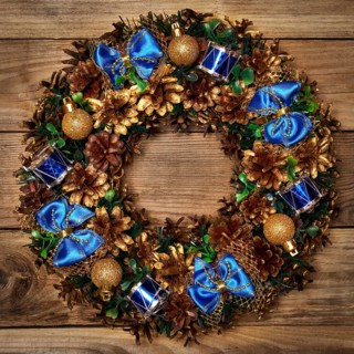 Christmas wreath on wooden background