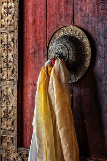 Decorated door handle of gates of Thiksey gompa (Tibetan Buddhist monastery) . Ladakh, India, Asia