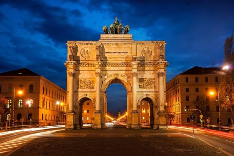 Siegestor (Victory Gate) in the evening. Motion blur because of long exposure. Munich, Bavaria,