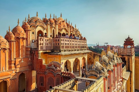JAIPUR, INDIA, NOVEMBER 18, 2012: Tourist visiting Hawa Mahal palace (Palace of the Winds) famous