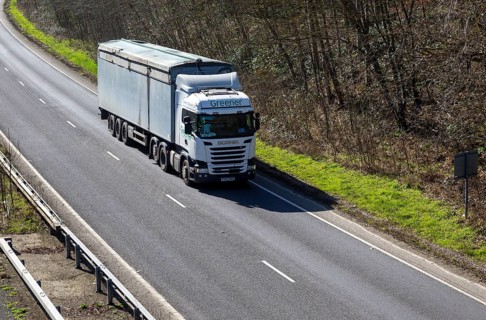 Scania Greener lorry HGV on A12 dual carriageway road, Loudham, Suffolk, England, UK