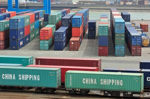Stacked containers in the container terminal in the port of Zeebrugge, Belgium, Europe