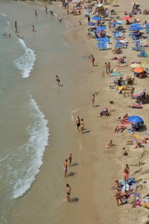 Bathers on Playa Poniente, Benidorm, Costa Blanca, Spain beach