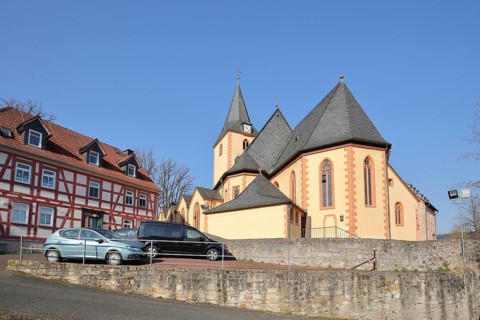 Romanesque St. Martin Church and half-timbered house, Bad Orb, Spessart, Hesse, Germany, Europe