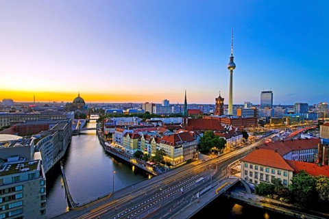 City panorama with Spree, Cathedral, Nikolai Quarter, Red City Hall and TV Tower in the evening,