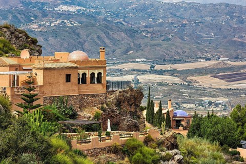 Luxury holiday home on the hillside, Moorish style with terrace, garden and domes, view from above,