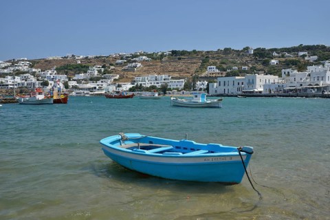 Fishing boat in the harbor of Mykonos Town or Chora, Mykonos, Cyclades, Greece, Europe