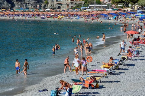 Bathers on the beach of Levanto, Cinque Terre, province of La Spezia, Liguria, Italy, Europe