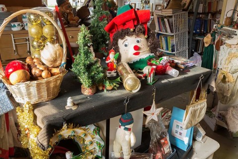 Christmas ornaments for sale inside second hand goods and chattels store, Quebec, Canada, North