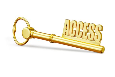 Access concept, golden access key made of gold isolated on white background