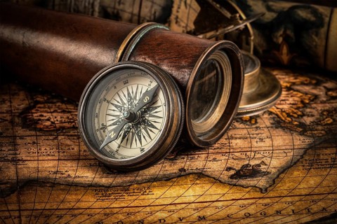 Travel geography navigation concept background, old vintage retro compass with sundial, spyglass