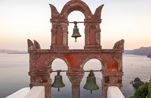 Old belfry wiith view of sea at dusk, Ia, Oia, Santorini, Greece, Europe