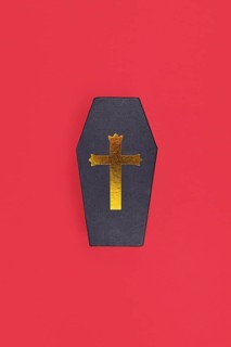 Coffin shaped Halloween cardboard gift box on red background