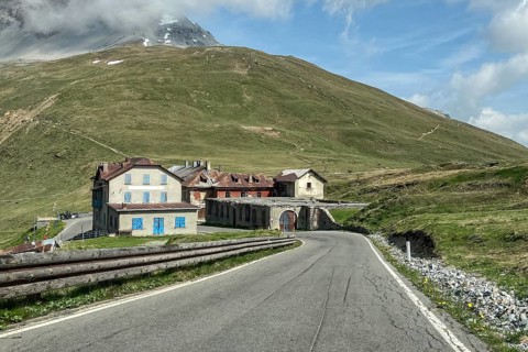 View on mountain road pass road alpine road above tree line southern descent from alpine pass pass