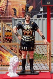 Roman general, life-size figure in front of a fairground ride at the Düsseldorf Rhine Fair,