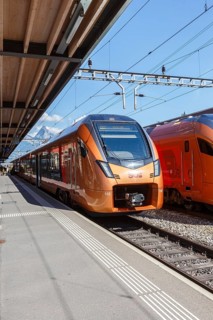 Railway passenger trains of the type Stadler Flirt of the Südostbahn at Arth-Goldau station,