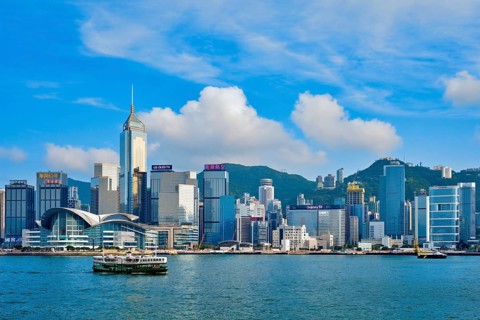 HONG KONG, CHINA, MAY 1, 2018: Hong Kong skyline cityscape downtown skyscrapers over Victoria