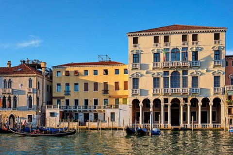 VENICE, ITALY, JUNE 27, 2018: Grand Canal with boats and gondolas on sunset, Venice, Italy, Europe