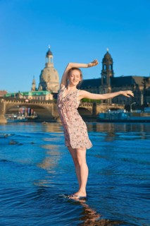 Young woman on the Elbe meadows in Dresden