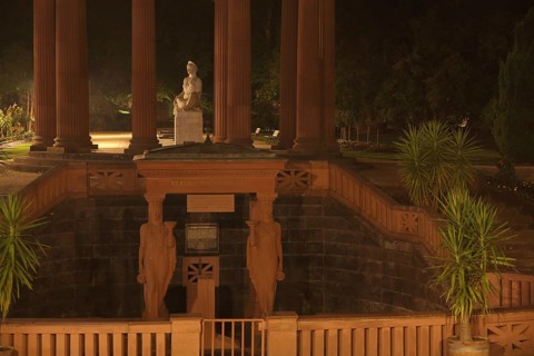 Neoclassical Elisabethenbrunnen with temple and Greek goddess Hygieia, night view, figures,