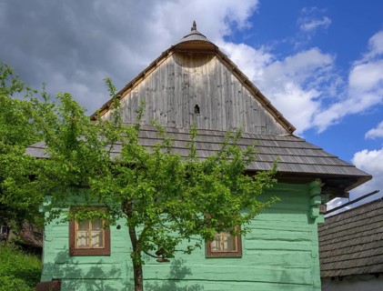 Colourfully painted wooden house in the village of Vlkolinec, Unesco World Heritage Site,