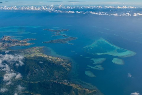 Aerial of little islets of the coast of Viti Levu, Fiji, South Pacific, Oceania
