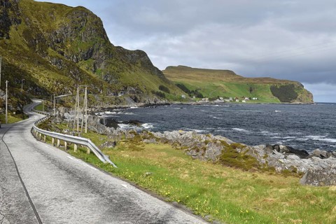 Houses, road on the island of Runde in Norway