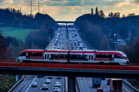 A3 motorway between Düsseldorf and Leverkusen, near Erkrath, railway bridge, Regio train