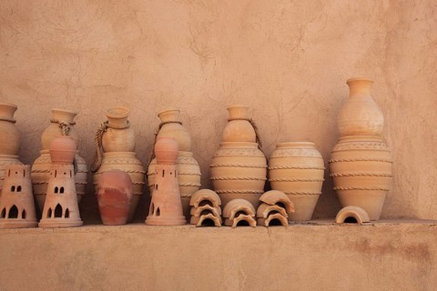Clay jars in the courtyard of Nizwa Fort. Nizwa is the centre of the Omani heartland. The oasis