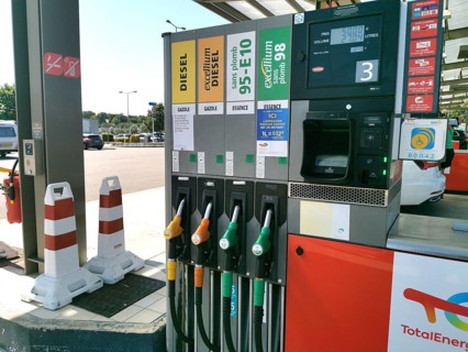 Petrol pump with nozzles for petrol and diesel at a motorway filling station in France, Automatic
