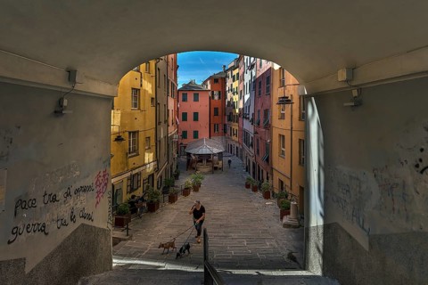 Colourful houses in Piazza Truogoli di Santa Brigada, below one of the few remaining public wash