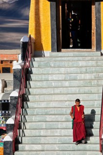 THIKSEY, INDIA, SEPTEMBER 13, 2012: Tibetan Buddhist monk in Thikse (Thiksey) gompa (monastery),