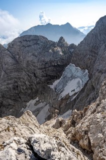 View of rock faces with blue ice glacier and summit of the Hochkalter, Berchtesgaden Alps, Bavaria,