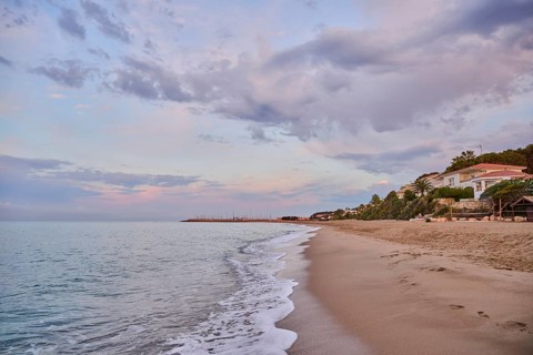 Sunrise with morning colors on a sandy beach near Tarragona, Catalonia, Spain, Europe