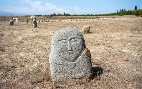 Balbals, historical gravestones in the shape of human faces, near Tokmok, Chuy, Kyrgyzstan, Asia