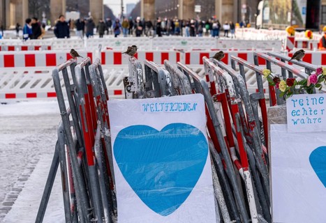 Demonstration, posters and barriers at the Brandenburg Gate, Berlin, Germany, Europe