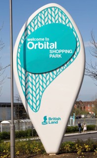 Sign for Orbital Shopping Park developed by British Land, north Swindon, Wiltshire, England, UK