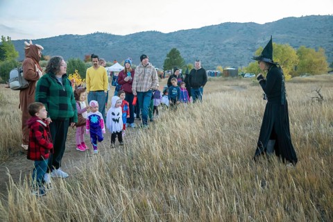 Lakewood, Colorado, Families enjoy the pre-Halloween Haunted Trail event at Bear Creek Lake Park. A