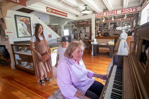 Eagle, Colorado, The Eagle County Historical Museum. A museum worker operates a player piano for