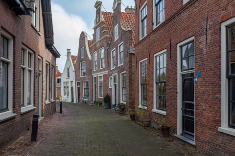 Alley with historic houses in the town of Blokzijl, province of Overijssel, Netherlands
