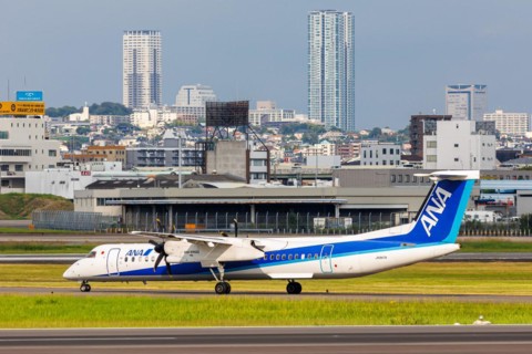 An ANA Wings Dash 8 Q400 aircraft with registration number JA847A at Itami Airport (ITM) in Osaka,