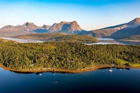 Aerial view over the fjord Efjord south of Narvik, seen at sunset, leisure boats anchor, holiday