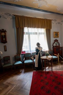 Art Nouveau museum, woman standing at the window, Art Nouveau buildings are part of the Unesco