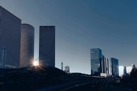 Israel, Tel Aviv financial business district skyline includes shopping malls and high tech offices,